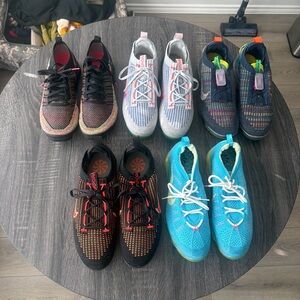 Nike Kids Sneakers in Black, White, and Blue